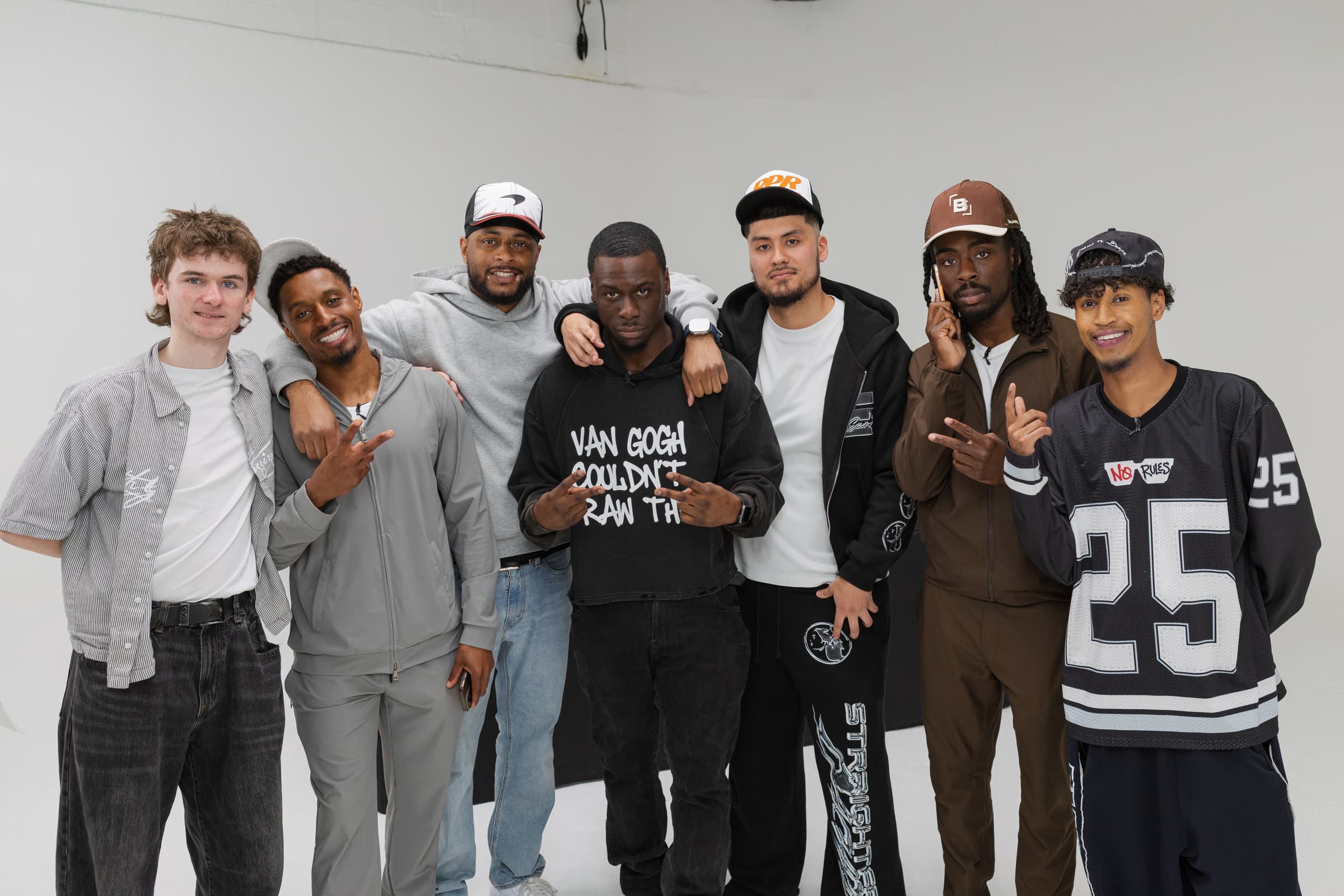 A group lined up in the studio